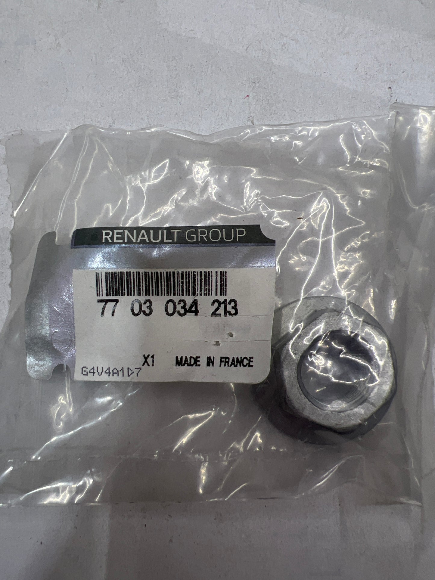 7703034213 TUERCA RENAULT