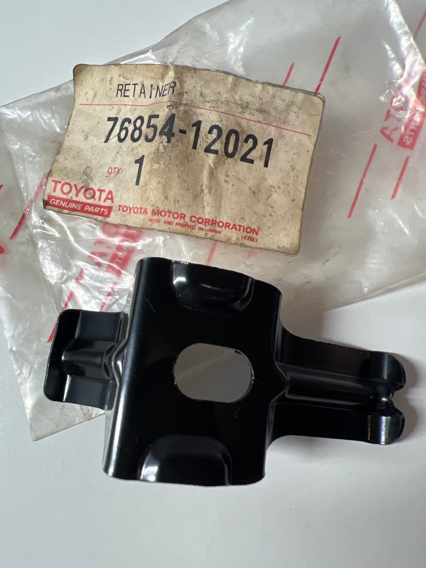 76854-12021, RETENEDOR, SPOILER DELANTERO, SUPERIOR IZQUIERDO, Toyota - Lexus