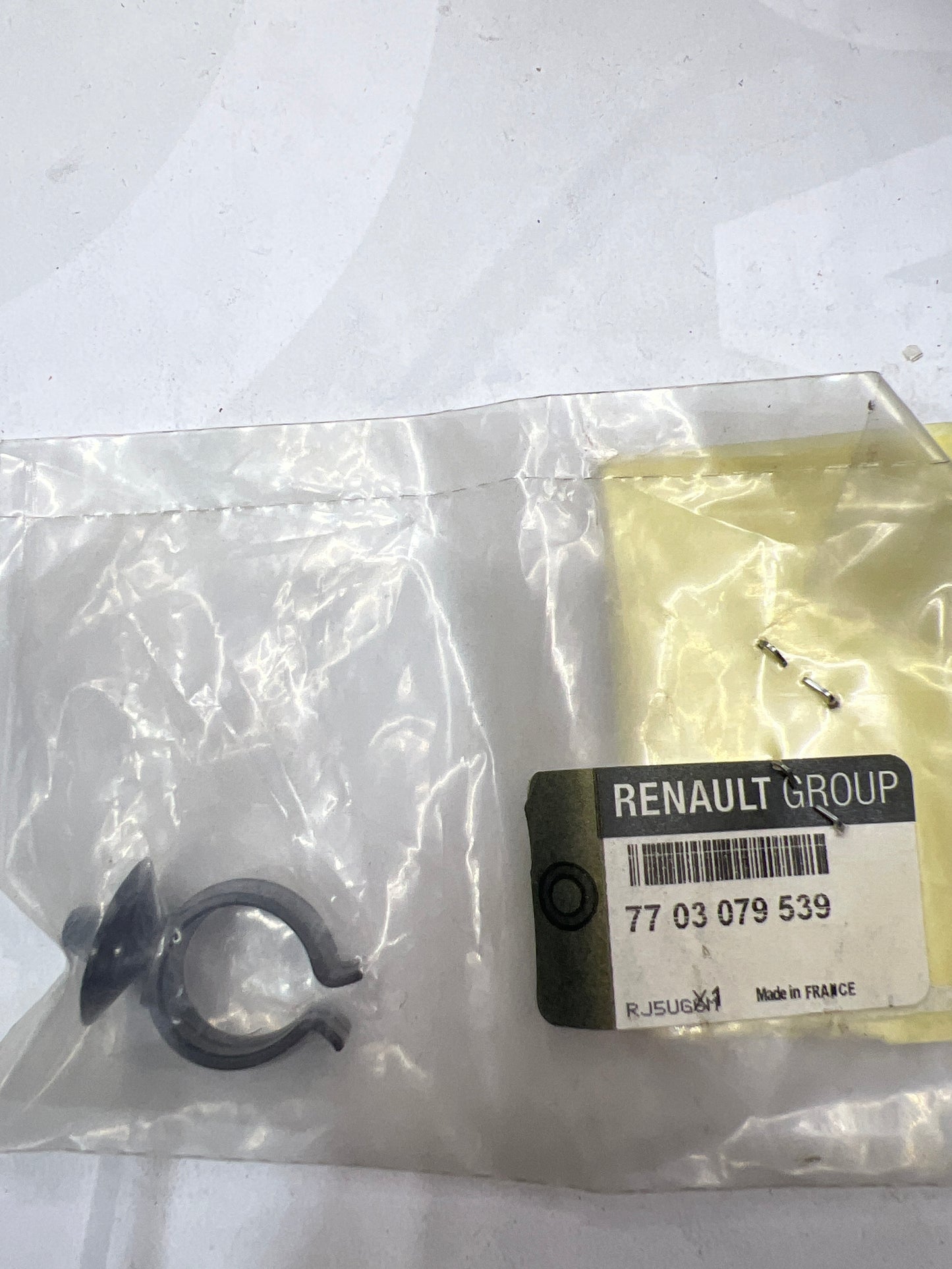 7703079539 GRAPA SOPORTE RENAULT