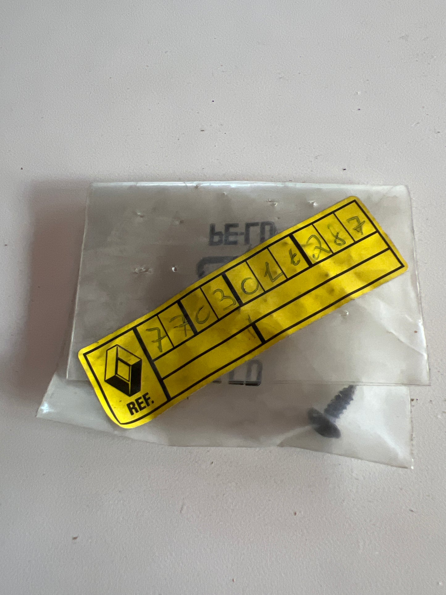 7703016287 TORNILLO FIJ TAPA RENAULT