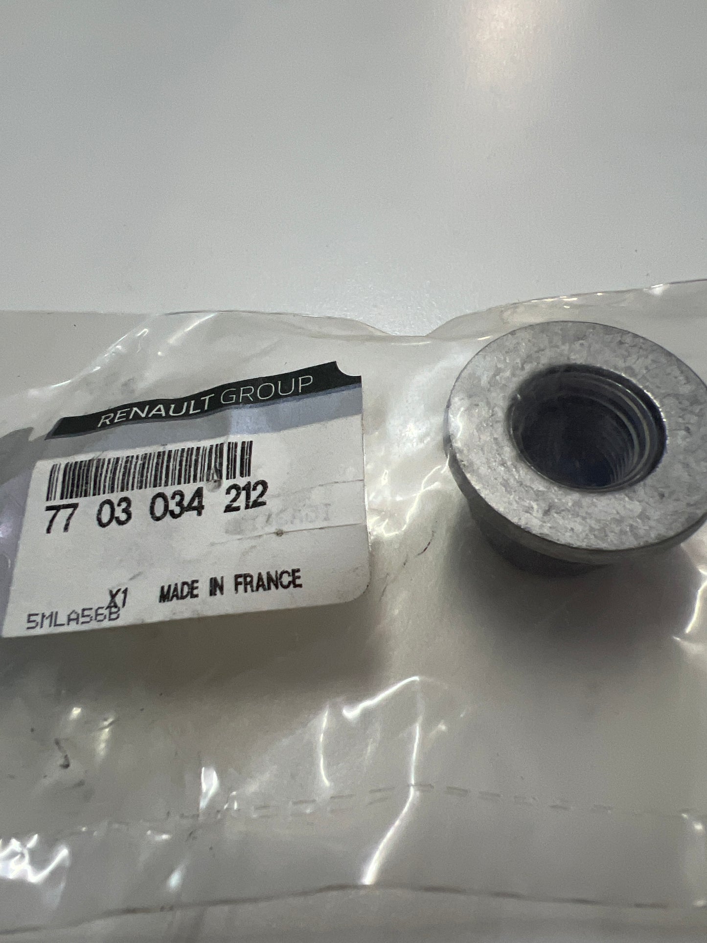 7703034212 - TUERCA M14 - Renault