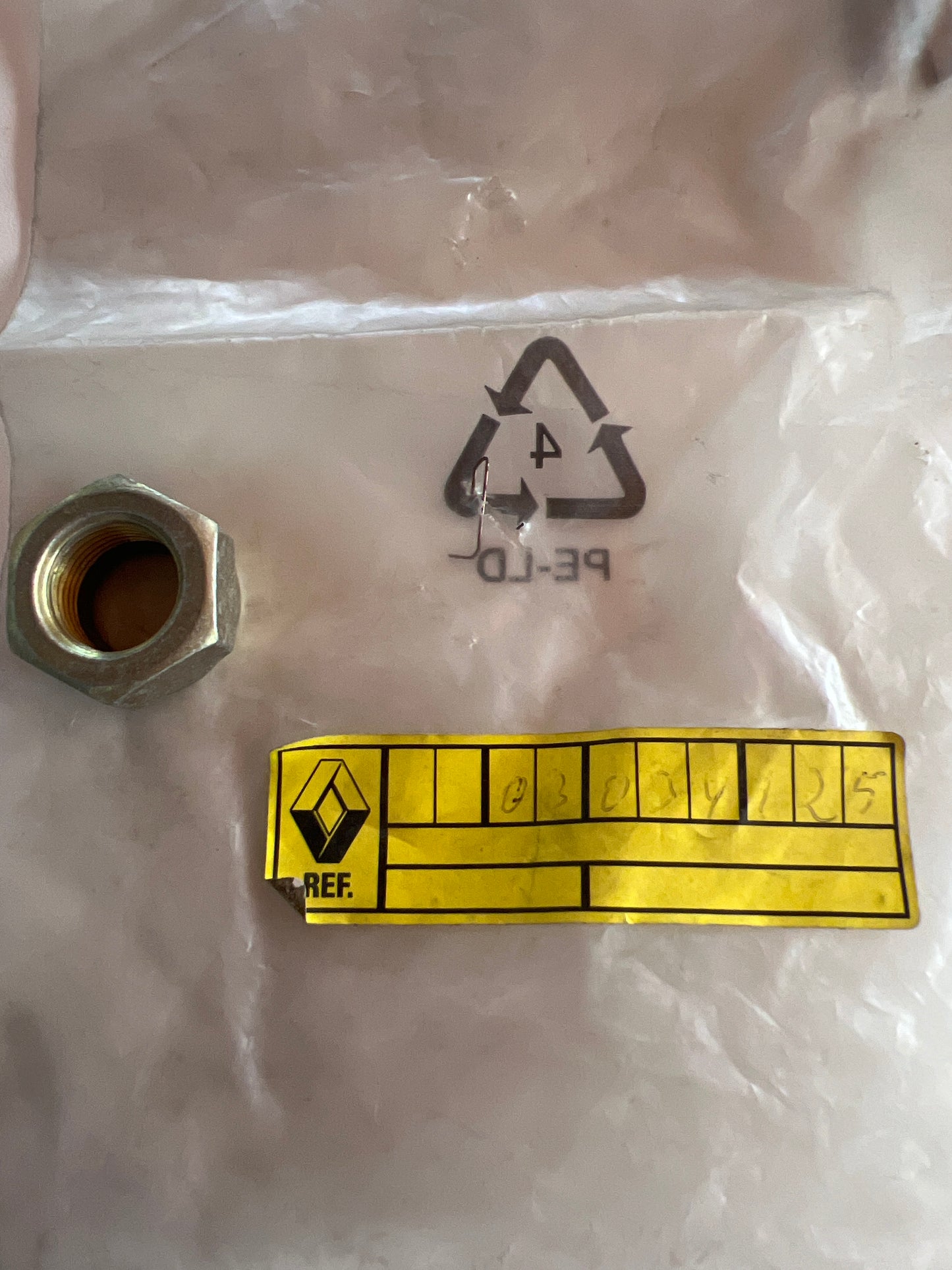 7703034125 TUERCA RENAULT