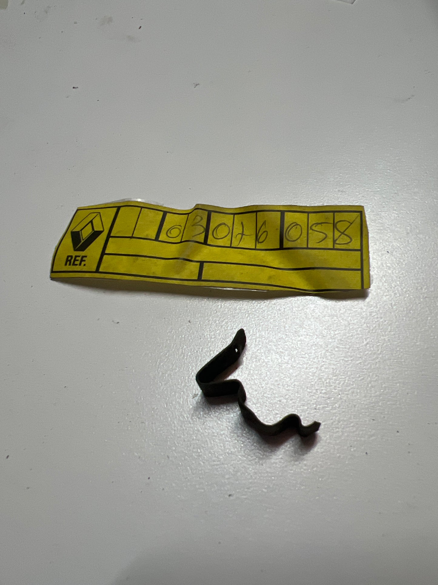 7703076058 MUELLE CERRADURA RENAULT